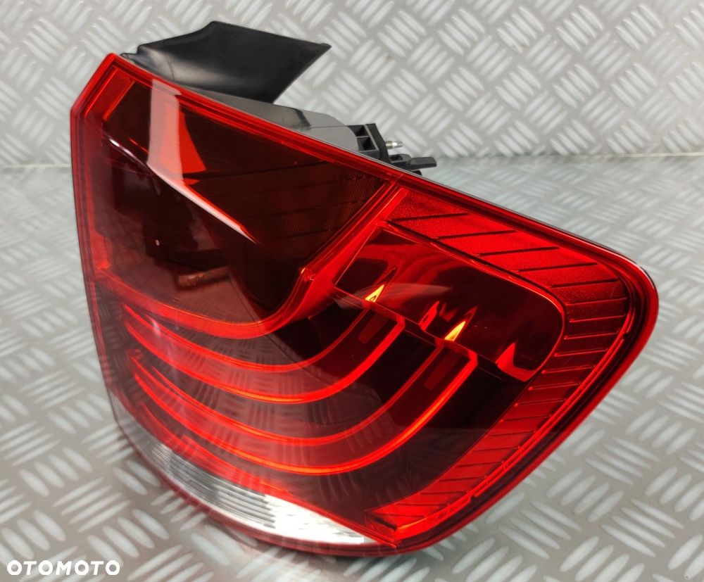 2990110 lampa prawa prawy tył tylna w błotnik BMW X1 E84 2009-2015 EUROPA - 3