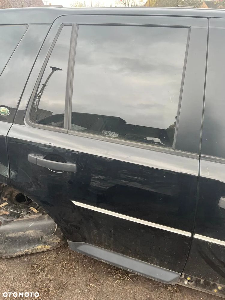 Drzwi tylne prawe LRC820 Santorini Black LAND ROVER FREELANDER 2 II 2007--> - 1