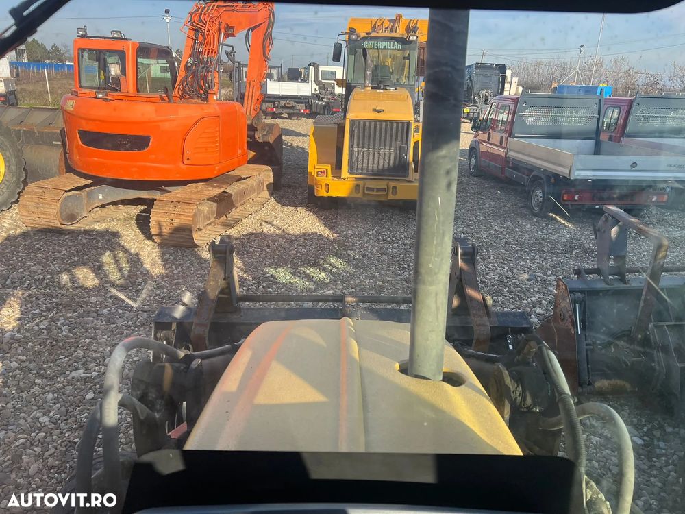 Caterpillar 438C - 14