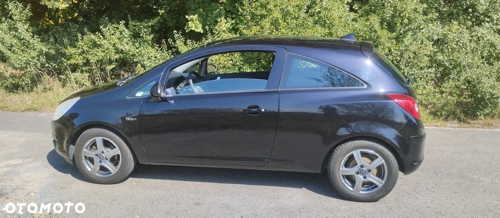 Opel Corsa 1.4 16V Cosmo - 12