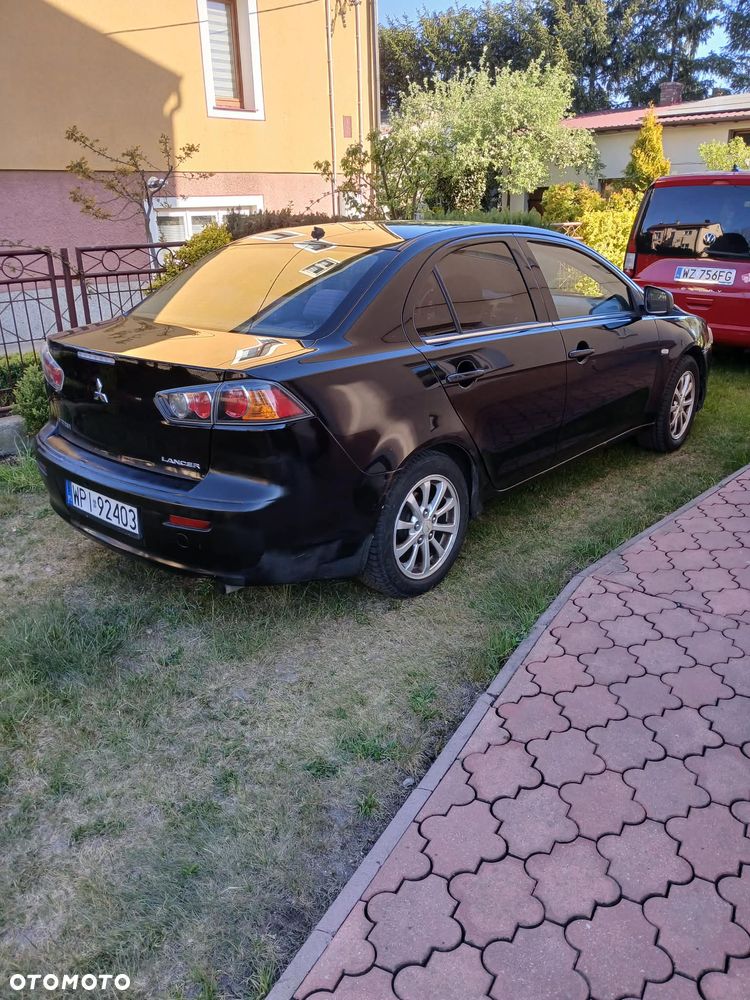 Mitsubishi Lancer 1.6 Invite - 2