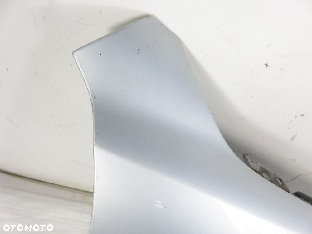 BŁOTNIK PRAWY PRZEDNI BMW E39 - 10