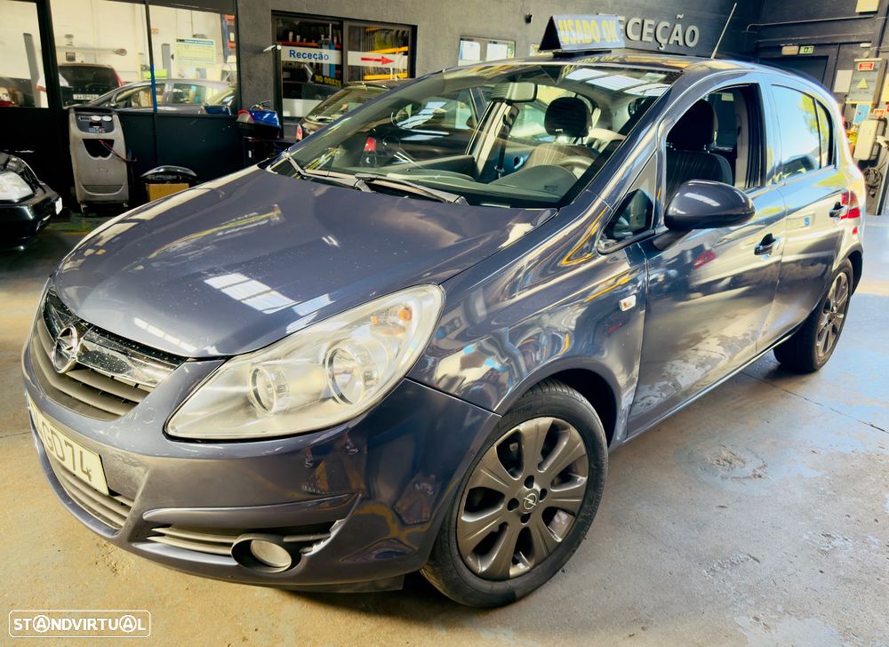 Opel Corsa 1.2 Cosmo - 1