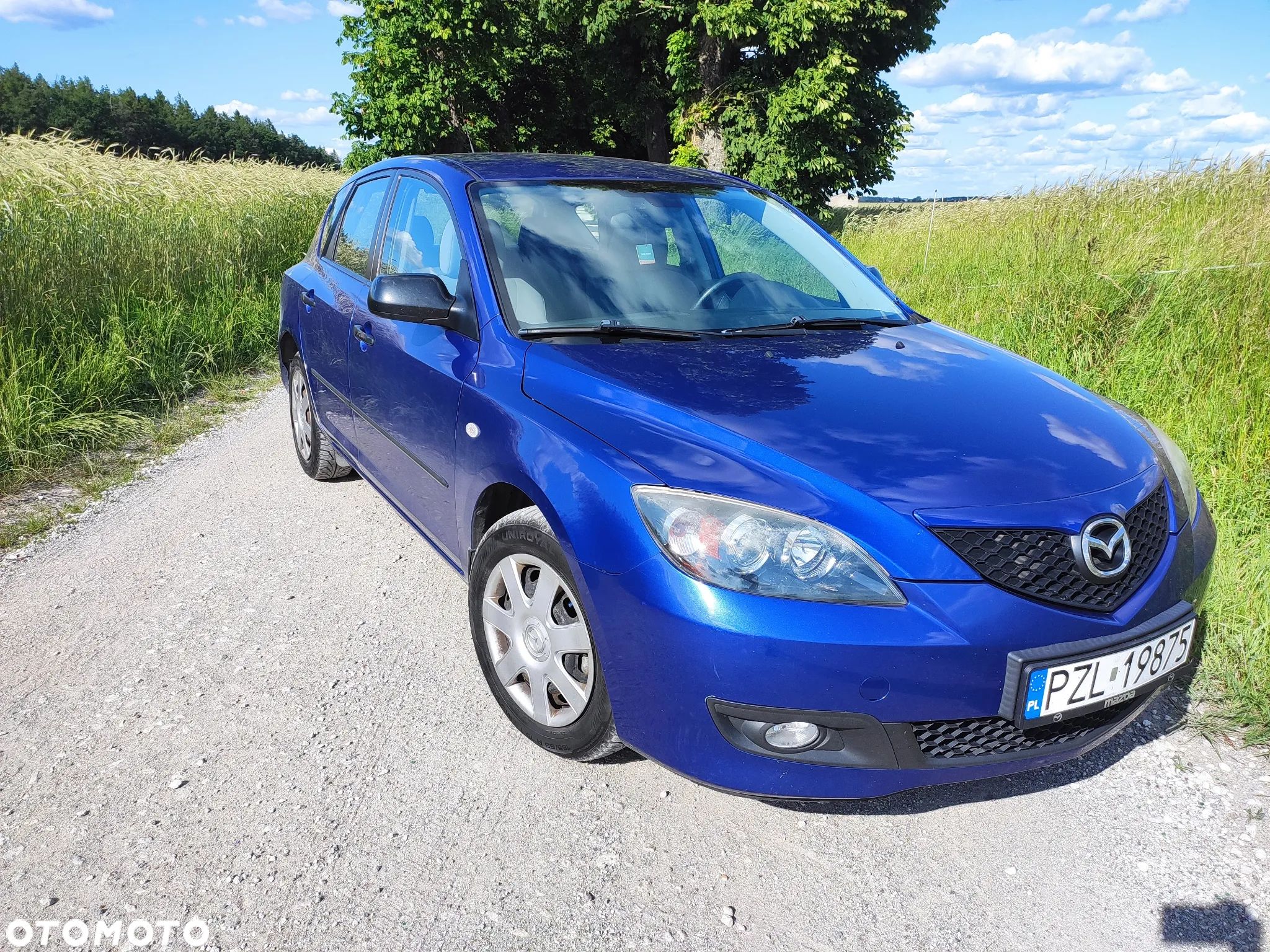 Mazda 3 1.4 Comfort - 1