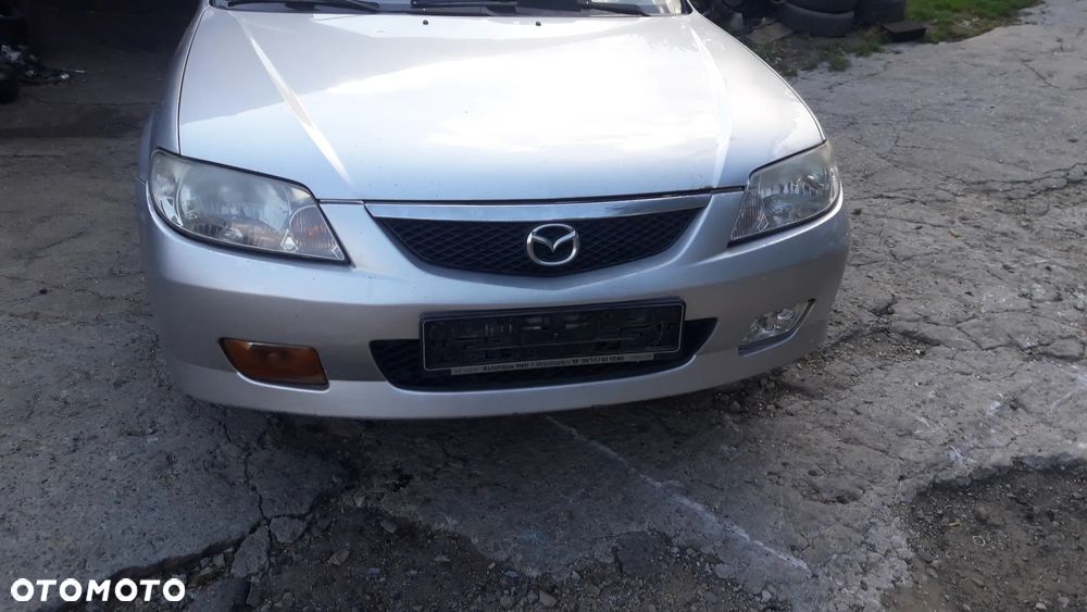 Mazda 323 323f BJ 98-03 Lift  Maska lampa zderzak pas atrapa 22V - 2