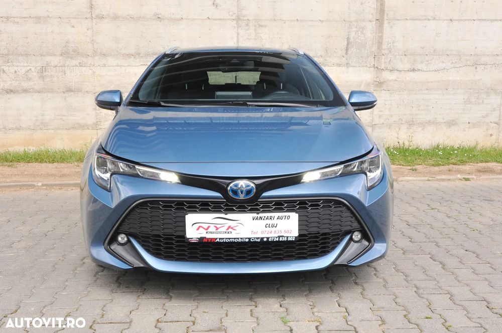 Toyota Corolla 1.8 HSD Business - 11
