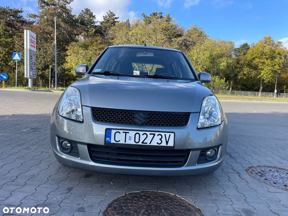 Suzuki Swift 2009 photo 2