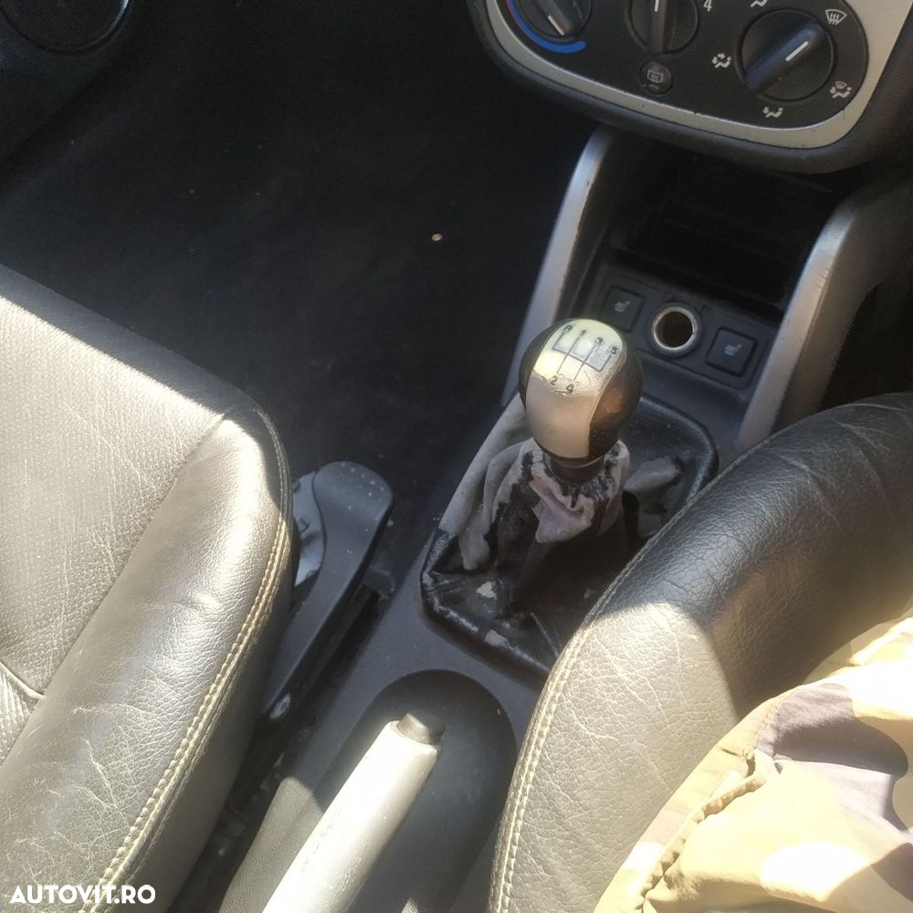 Dezmembrari  Opel TIGRA B TwinTop  2004  > 0000 1.4 Benzina - 8