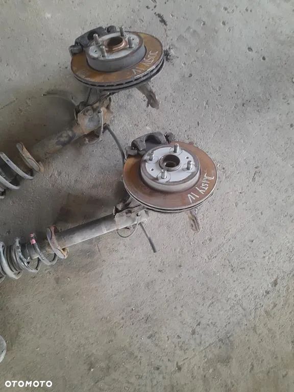 Amortyzator zwrotnica Macpherson Lewy prawy przod Justy IV 4 Sirion II 1.0b - 4