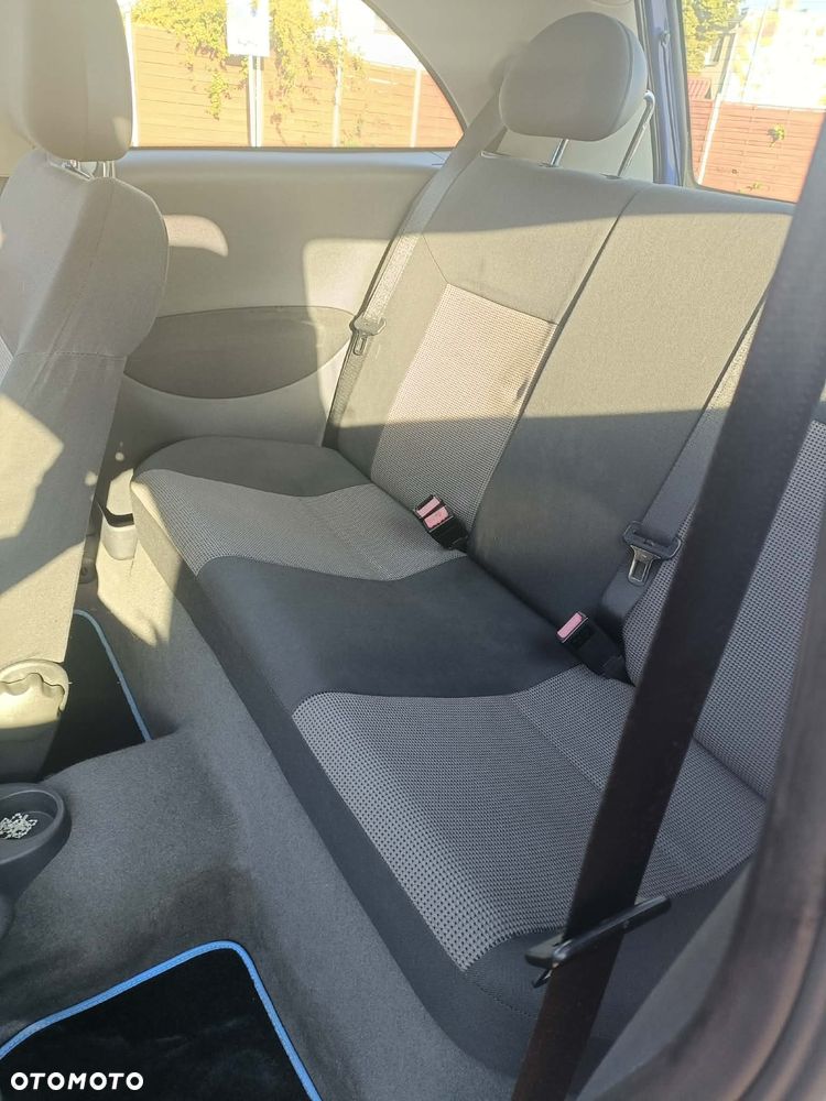 Opel Corsa 1.0 12V Cosmo - 10