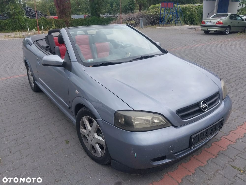 Opel Astra G Bertone Cabrio Cabriolet silnik 1.6 16v 103 KM skrzynia biegów F17 drzwi maska zderzak błotnik lusterko klapa Z4AU Z163 dach dachu składanego maglownica szyba podnośnik fotel kanapa zegary zestaw startowy czujnik felga maglownica zwrotnica sterownik panel moduł listwa wydech tłumik belka sanki zacisk jarzmo tarcza NA CZĘŚCI WSZYSTKIE CZĘŚCI - 1