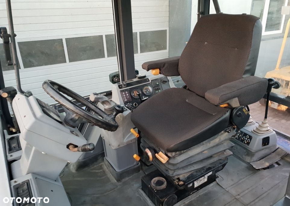 Case 595 Super LE ładowarka kołowa - 12