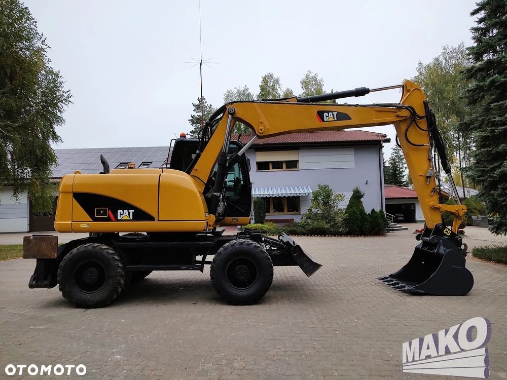 Caterpillar M313D - 5