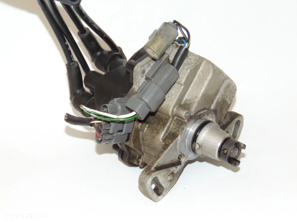 ORYGINAŁ aparat zapłonowy 22100-99B04 Nissan Micra K11 1.0 1.3 - 5