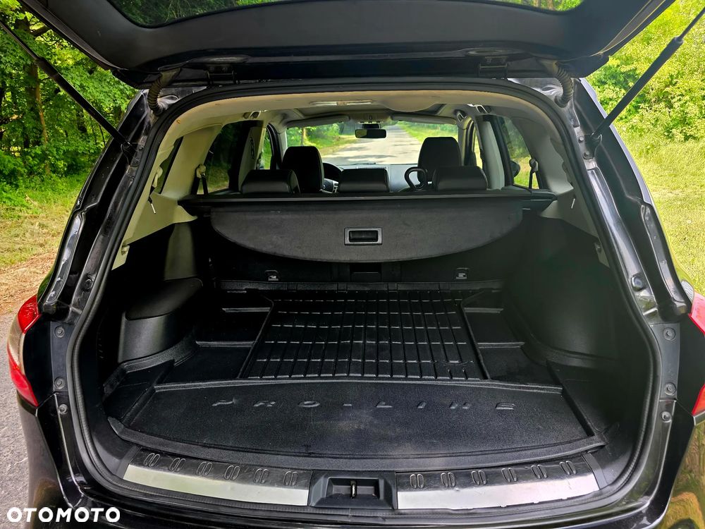 Nissan Qashqai+2 - 14