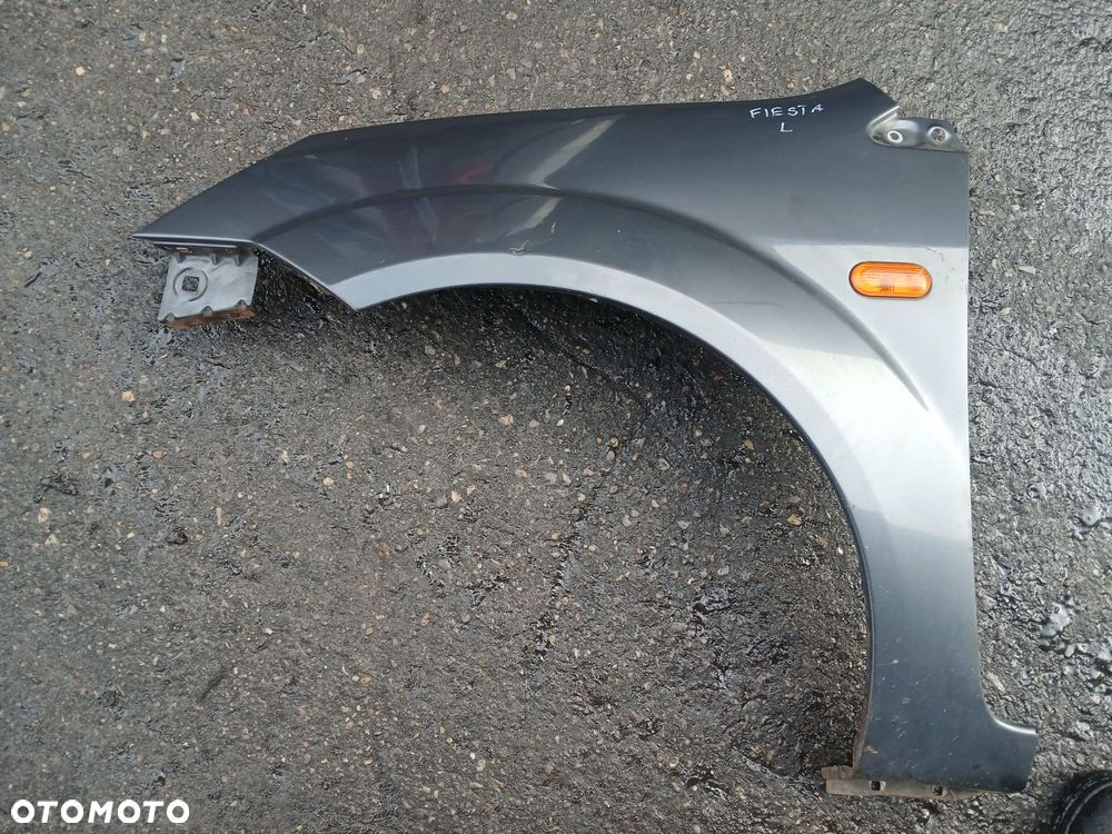 Ford Fiesta Mk6 Błotnik lewy - 1