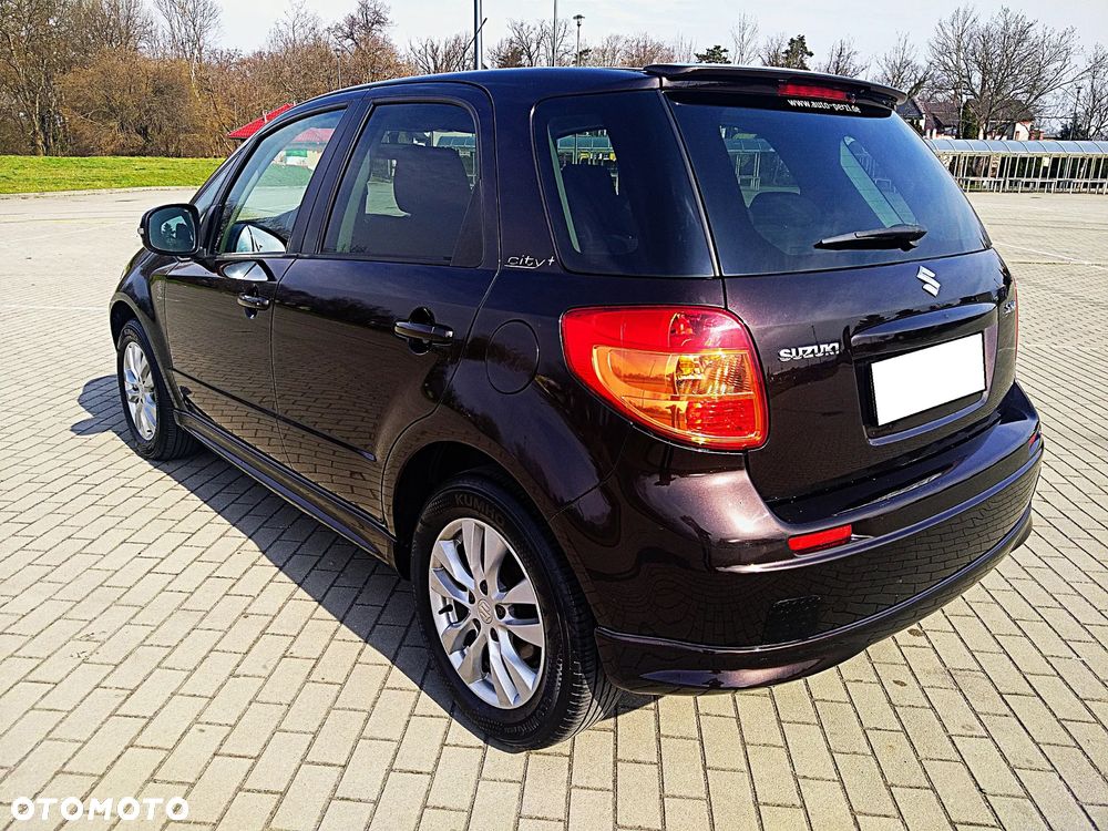 Suzuki SX4 1.6 Comfort Plus - 9