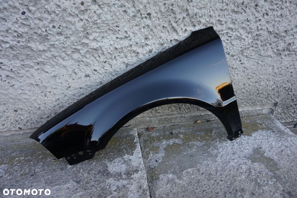 BŁOTNIK PRZÓD LEWY VW PASSAT B5 LIFT LO41 03/05r