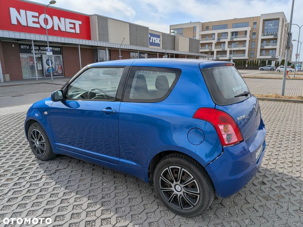 Suzuki Swift 1.3 Sakura - 14