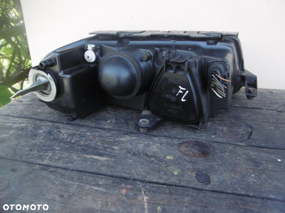 lampa lewa Passat B5 FL Hella Europa - 5