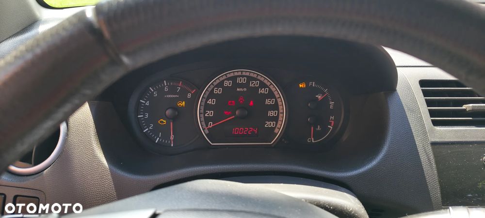 Suzuki Swift 1.3 Club - 4