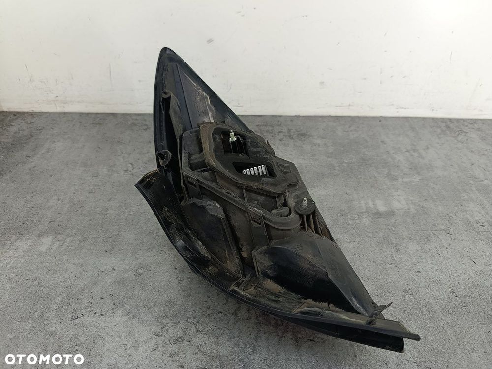 LAMPA TYLNA LEWA OPEL ASTRA H GTC 13252443  93357459 342691834 HATCHBACK 3D - 6