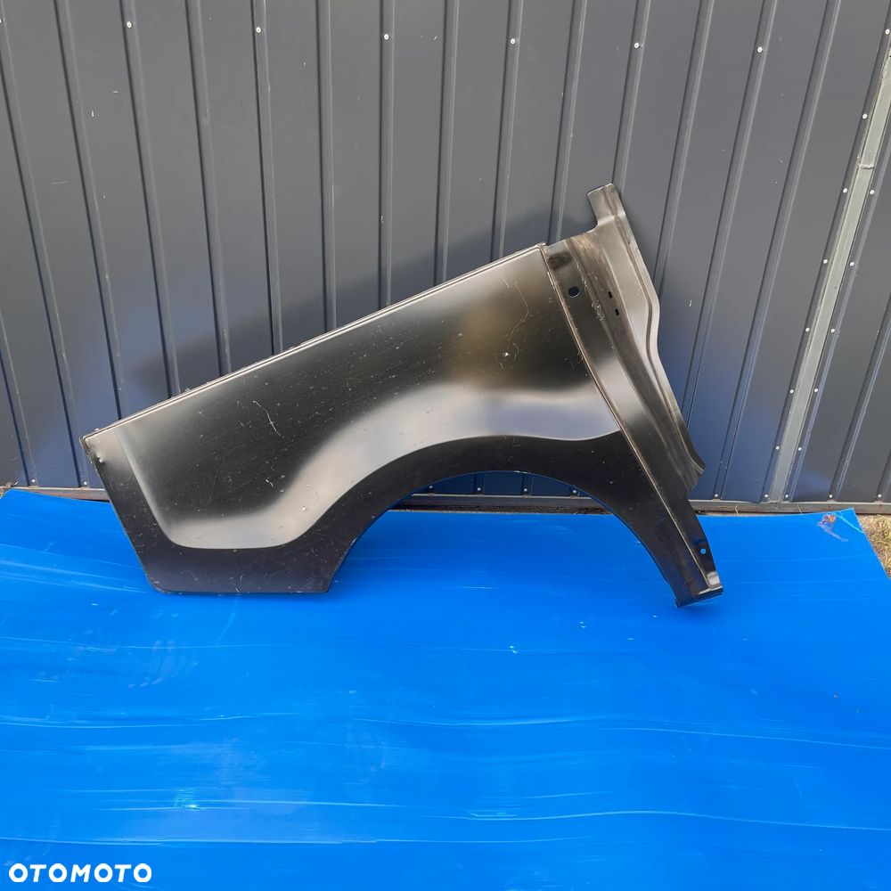 RENAULT TRAFIC III VIVARO B BŁOTNIK PRAWY TYŁ 760205039R