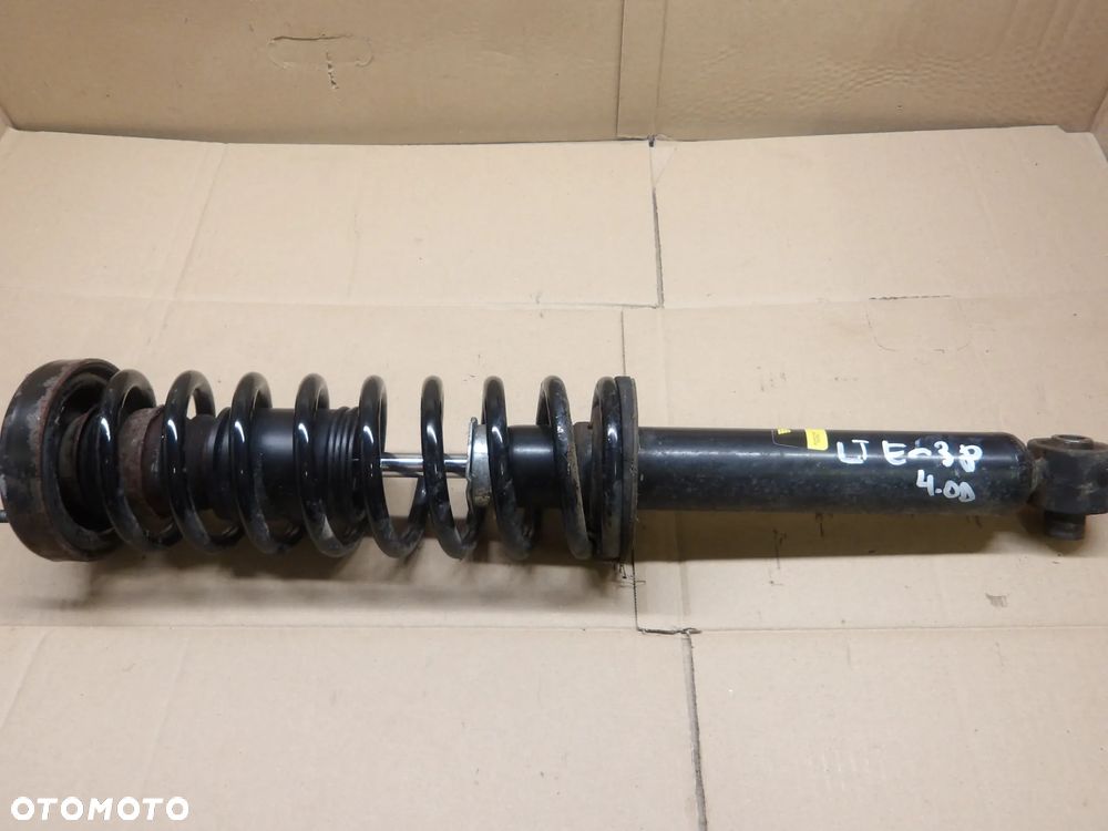 BMW E38 LIFT 99-01r. AMORTYZATOR LEWY TYŁ - 1