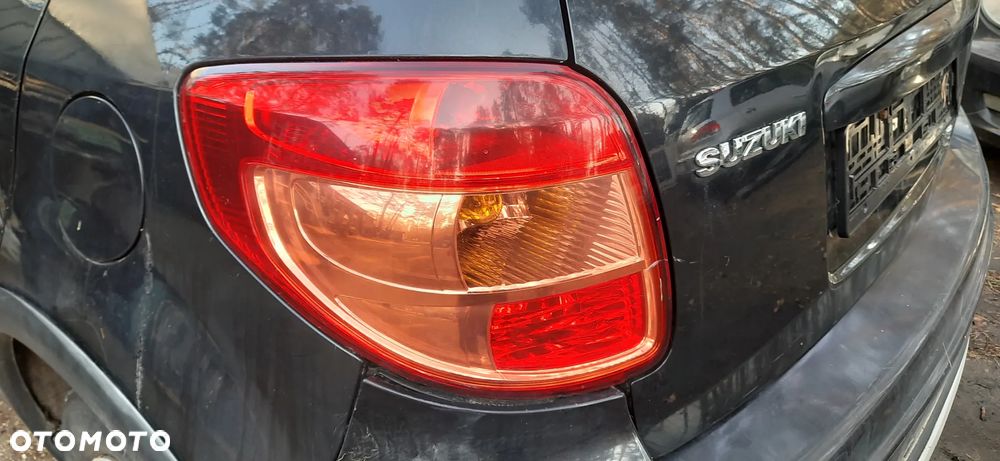 SUZUKI SX 4 SX4 FIAT SEDICI 1.9 DDIS Części Blacharskie i mechaniczne Szyba przód , Skrzynia biegów 79JA Napęd na przód Turbosprężarka 55205475 - 7