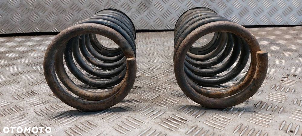 SPRĘŻYNA LEWY TYŁ + PRAWY TYŁ FORD SIERRA - 4