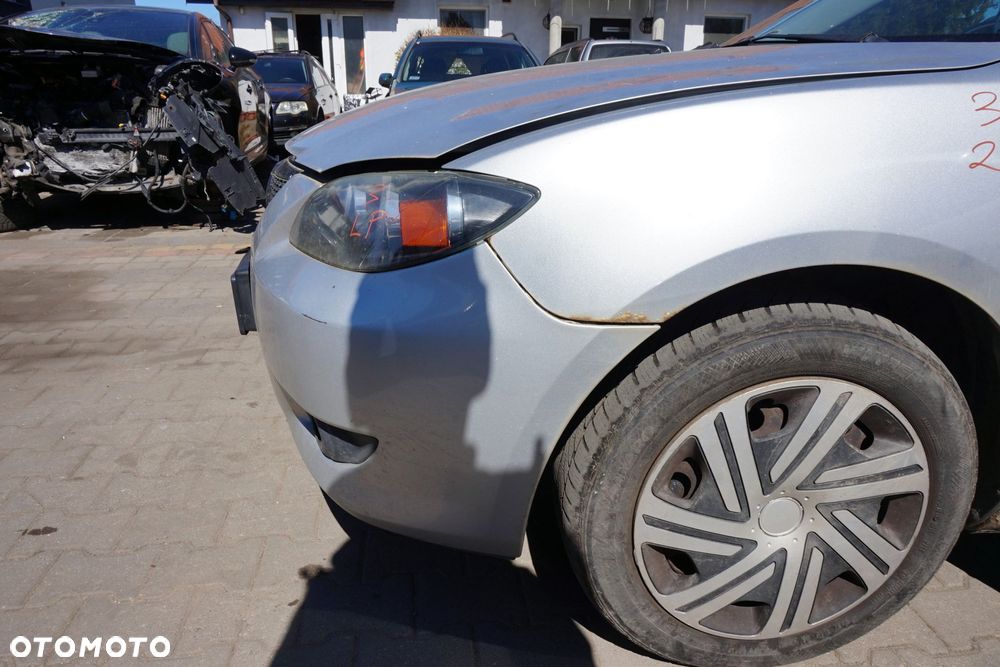 MASKA ZDERZAK BŁOTNIKI LAMPY 3 I BK 22V  MAZDA 2003-2006 SREBRNY PRZÓD KOMPLETNY - 23