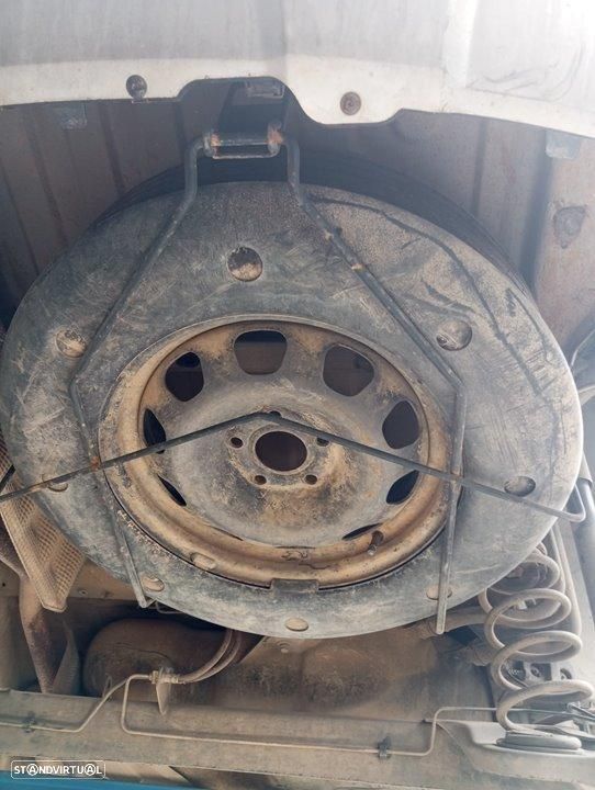 SUPORTE DA RODA SUPLENTE DACIA DUSTER I - 1