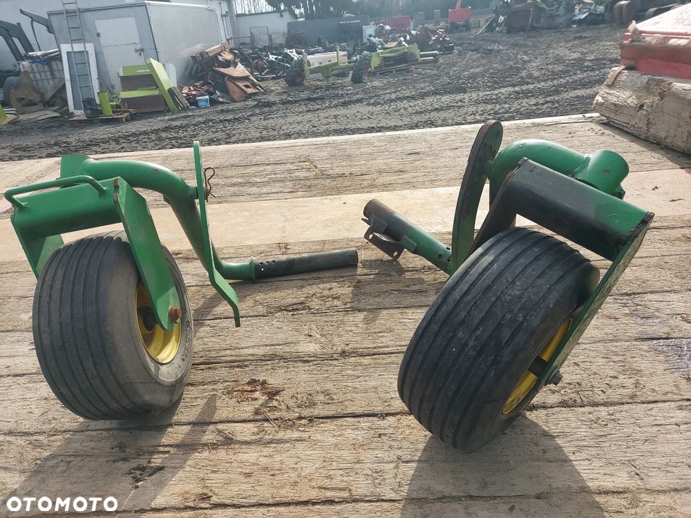 Koło koła ramiona podbieracza skrętne DC204232 DC203465 JOHN DEERE 592 2005r - 2