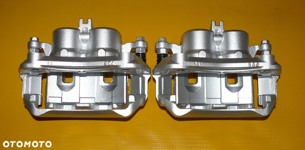 ZACISKI JARZMA LEWY PRAWY PRZÓD NISSAN PATHFINDER III 3 R51 296/28mm 04-10r - 6