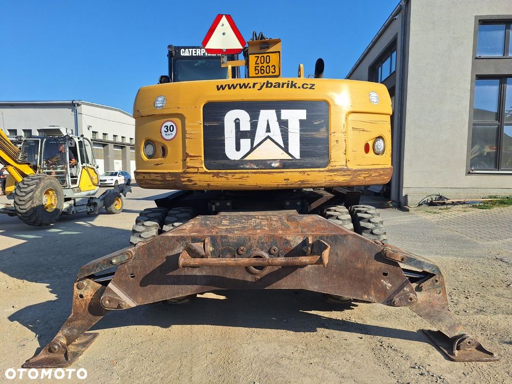 Caterpillar M315D 4X4 - 6