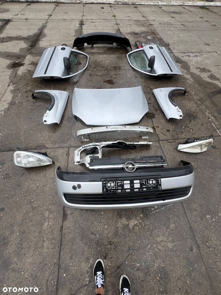 Zderzak przedni Corsa  drzwi prawe lewe przód tył lampy przednie tylne - 1