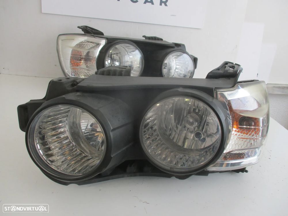 Farol optica chevrolet Aveo 2011 - 2