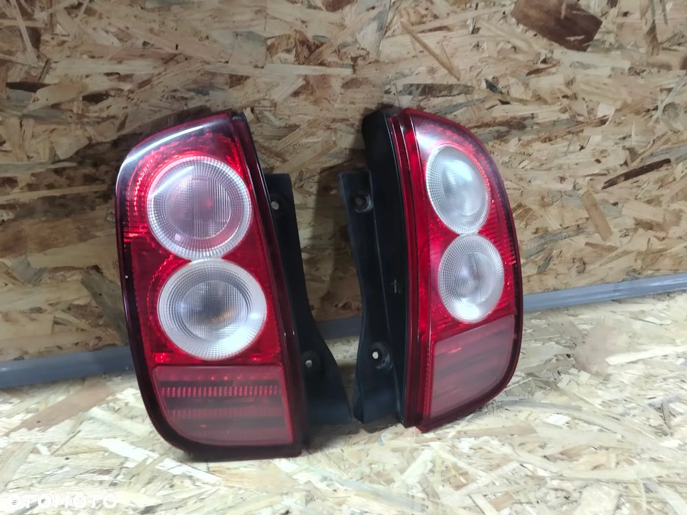 LAMPY TYŁ NISSAN MICRA K12 LEWA PRAWA 5 DRZWI - 1