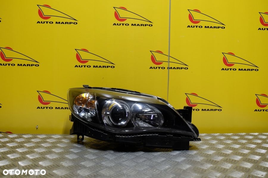 SUBARU IMPREZA GH 2007- REFLEKTOR LAMPA ZWYKŁA SOCZEWKOWA R EU - 2