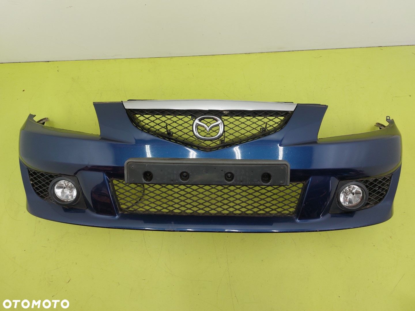 Zderzak przód przedni Mazda Premacy I LIFT 2001-2005 HALOGENY - 1