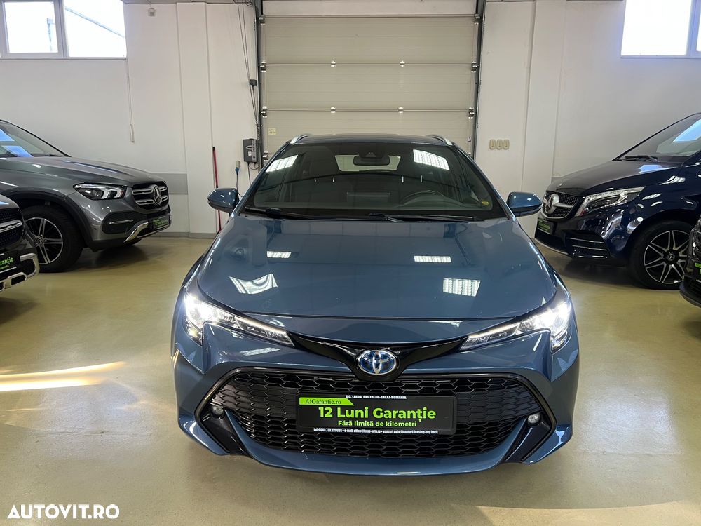 Toyota Corolla 1.8 HSD Business - 36