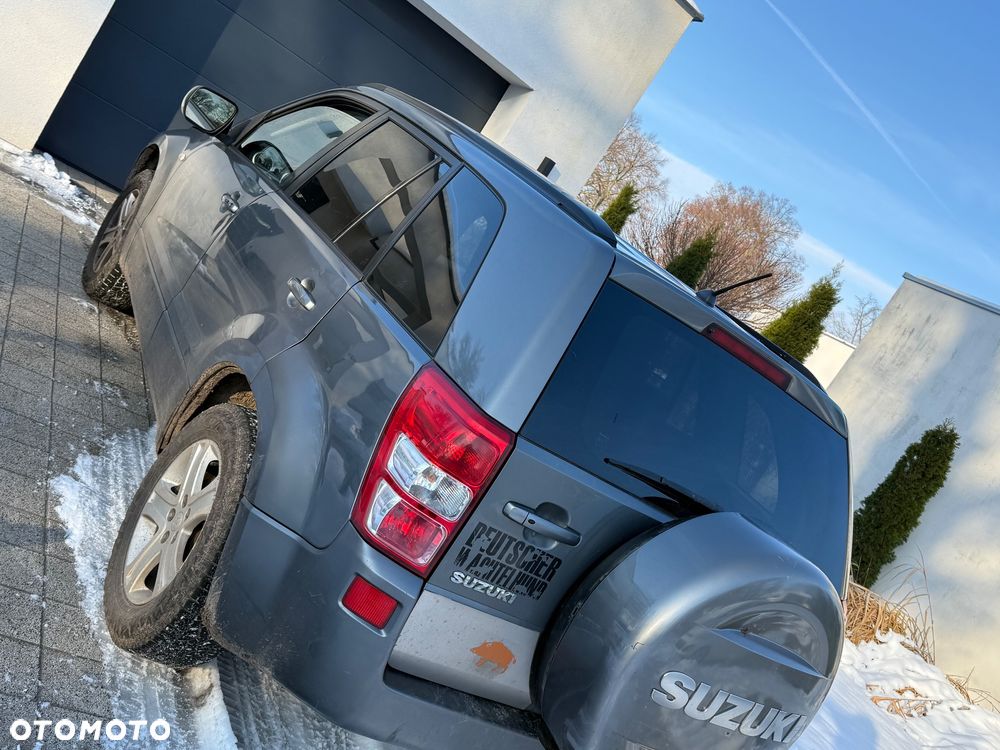 Suzuki Grand Vitara 2.0 Comfort + Family - 7