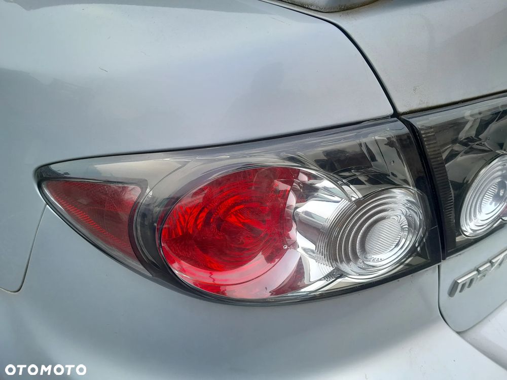 Lampa tylna lewa w błotnik czarna MAZDA 6 GG 02-08r. HB Europa - 2