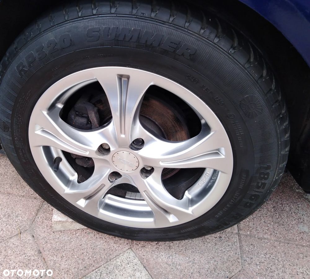 Opel Corsa 1.2 16V Enjoy - 10