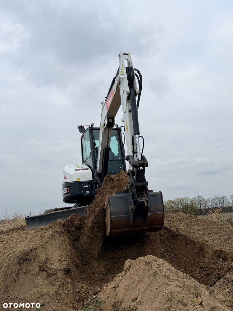 Bobcat Minikoparka Bobcat e50Z 5ton e55 e60 Cat 303.5 304  305 3xłyżki Ramię LOONG dodatkowe linie hydr wyjścia AUX1 + 2 przeciw waga MAX-dociążenie gąsienice 85% od nowości 1 właściciel z Niemiec Auto IDLEE po serwisie Widły wiertnica grabie i inne za dopłatą Szybkozłącze hydr Miller łyżka przedsiębierna Pług  Kubota Takeuchi Jcb - 34