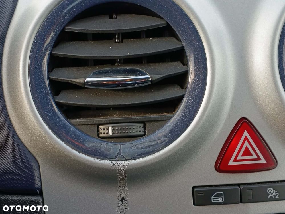 Opel Corsa 1.2 16V Enjoy - 11