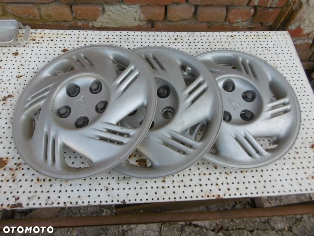 KOŁPAK DEKIEL PONTIAC TRANS SPORT - 1