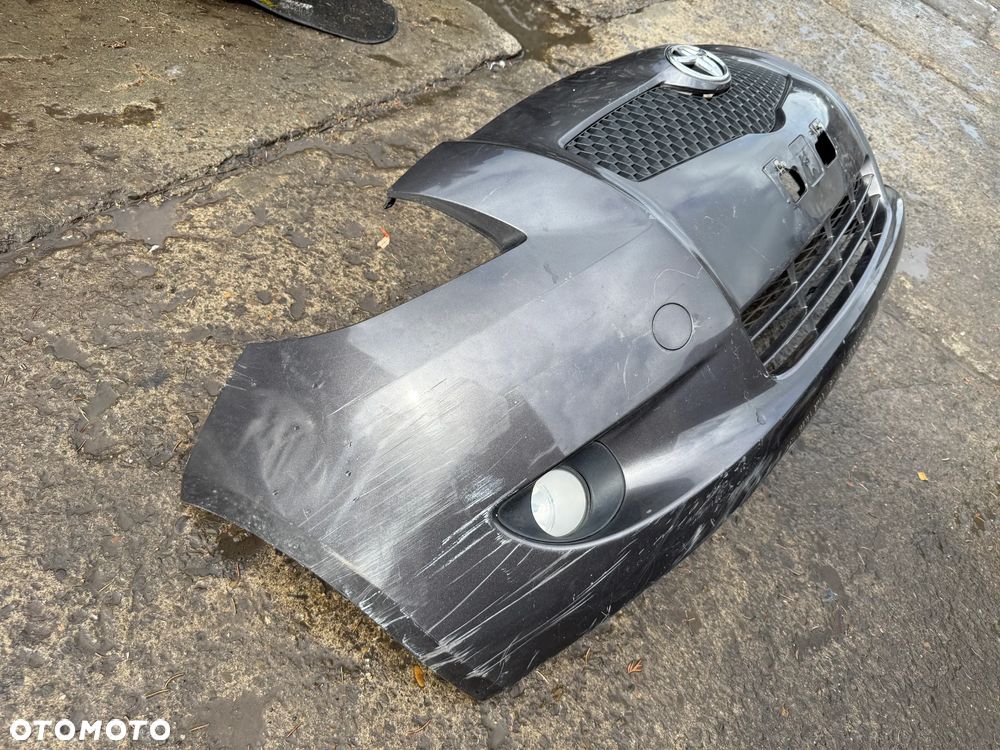 Zderzak Toyota Yaris II przód 3d OE - 3