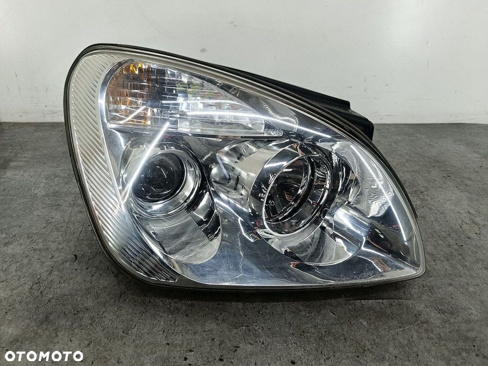 LAMPA PRZÓD PRAWA KIA CARENS III - 1