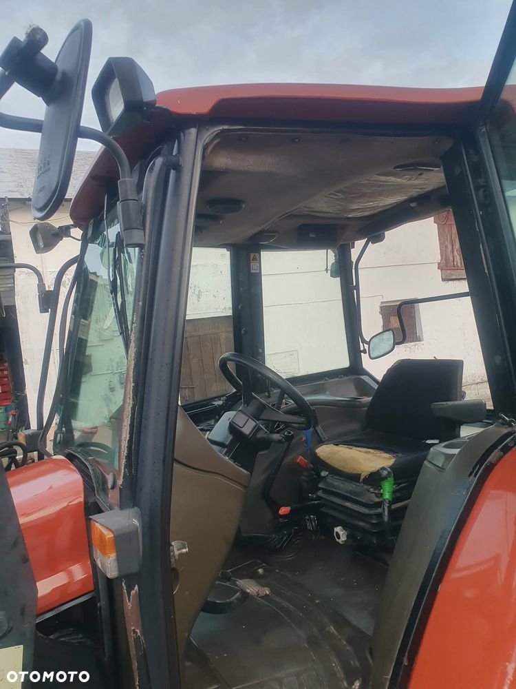 New Holland L65 DT z turem - 6